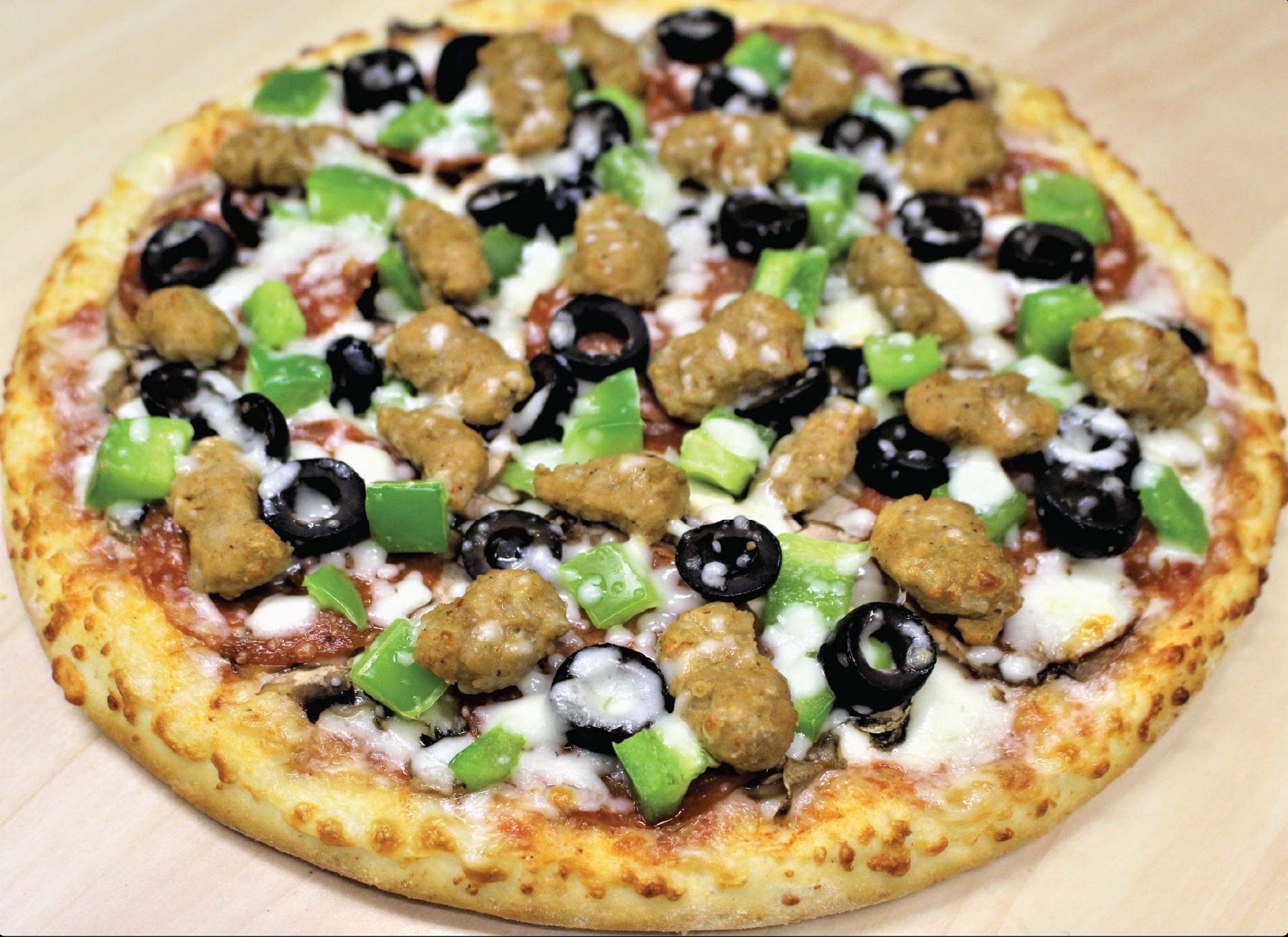 Deluxe/Supreme Pizza.